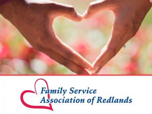 A heart made from two peoples hands and the Family Service Association of Redlands logo underneath.